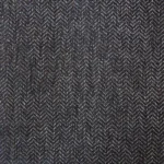 Dark charcoal herringbone woven fabric texture