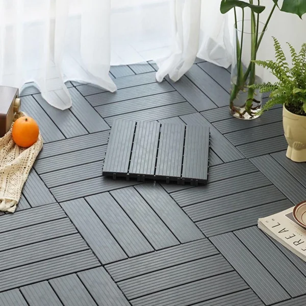 Grey interlocking composite deck tiles on a patio