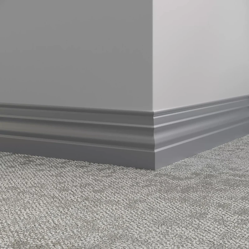 Grey profile MDF skirting board on textured carpet