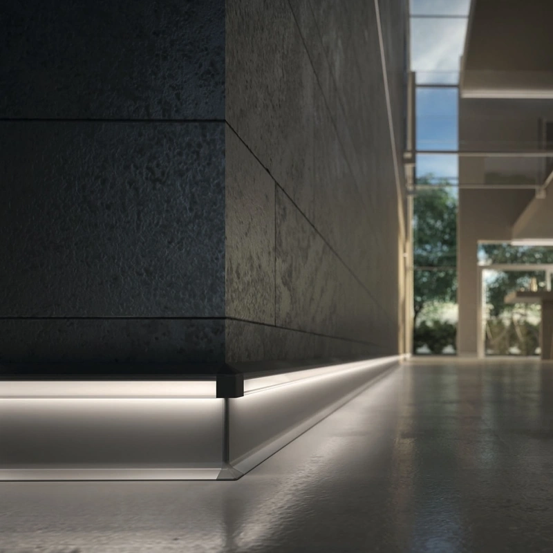 Silver LED aluminum skirting on dark stone wall