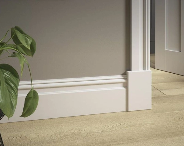 White MDF skirting board with plinth block