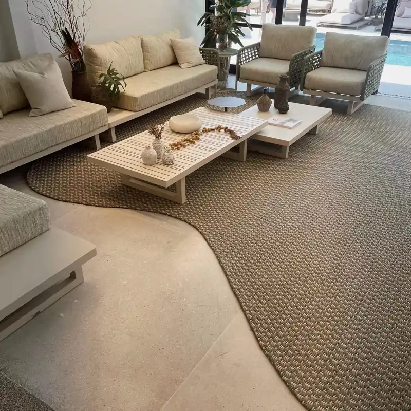 organic, curved-shaped outdoor carpet with a textured