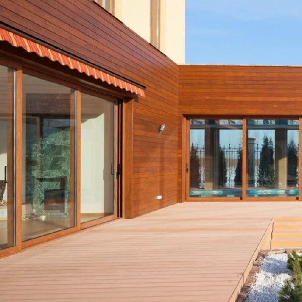 outdoor patio featuring rich, wood-grain PVC wall cladding