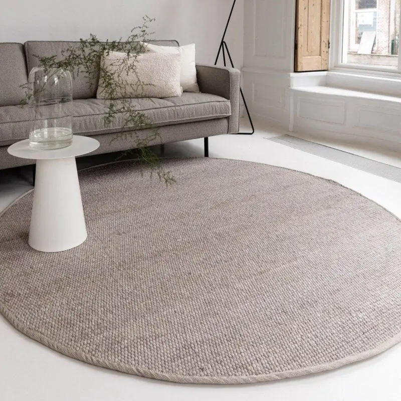 textured light grey round carpet