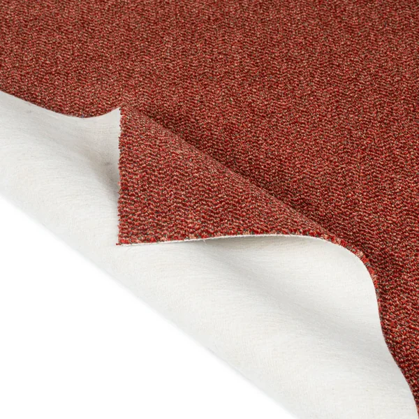 Red carpet swatch showing white felt backing