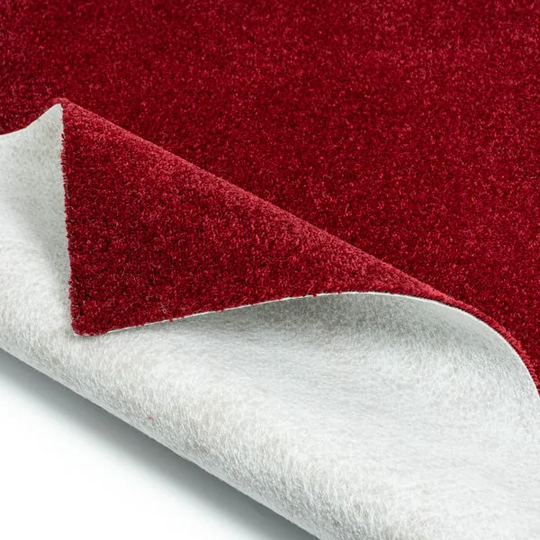 Red carpet swatch showing white felt backing